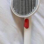 Cat comb pet grooming brush Simple design Pet Hair Cleaner Brush photo review